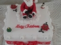 Christmas-cake-all-over-with-handmade-Santa-with-Poinsetta-tree-and-snowman-2019